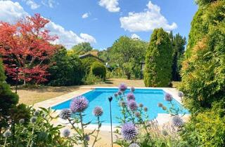 Einfamilienhaus kaufen in 2514 Traiskirchen, Sehr charmantes Einfamilienhaus mit traumhaftem Pool, Wintergarten, großem Carport und Garten mit einigen Extras