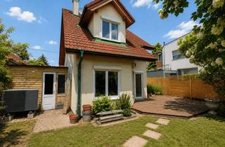 Einfamilienhaus kaufen in 1220 Wien, Lichtdurchflutetes Einfamilienhaus mit Garten, Kamin & Luftwärmepumpe