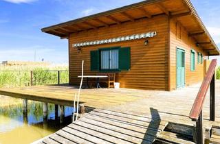 Haus kaufen in Mörbisch Am See, Seebühne, Seebad, 7072 Mörbisch am See, Ein Logenplatz am Wasser - Exklusive Seehütte auf Eigengrund im Neusiedler See!