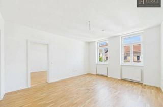Wohnung kaufen in 1100 Wien, Erstbezug direkt an der U1: Modernes Wohnen mit Klimaanlage & Terrasse in ruhiger Hoflage