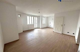 Wohnung kaufen in 1100 Wien, Neu renovierte 3-Zimmer-Dachgeschosswohnung mit Stadtblick in 1100 Wien