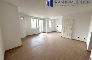 Wohnung kaufen in 1100 Wien, Neu renovierte 3-Zimmer-Dachgeschosswohnung mit Stadtblick in 1100 Wien