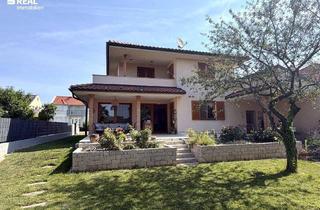 Einfamilienhaus kaufen in 7100 Neusiedl am See, Mediterranes Wohnambiente in Top Lage in Neusiedl am See - Exklusives Wohnen mit Stil, Komfort und Lebensqualität - mit Dichtbetonkeller!