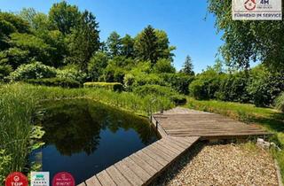 Einfamilienhaus kaufen in 2432 Schwadorf, Idyllisches Haus mit parkähnlichem Grundstück - Wohnen im Grünen vor den Toren Wiens!