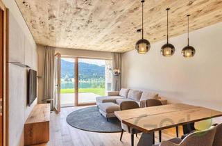 Wohnung kaufen in 9762 Techendorf, Exklusive 2 Zimmer Gartenwohnung mit Seeblick und alpinem Charme - Weisse Wand