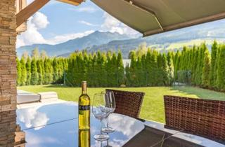 Wohnung kaufen in 5721 Piesendorf, Neuwertige Gartenwohnung mit Panoramablick – 6-Zimmer-Alpenlodge mit voll ausgebautes Souterrain