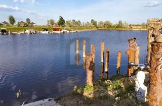 Haus kaufen in 7063 Oggau am Neusiedler See, Modernes Wohnen mit Direktem Seezugang - Eigengrund