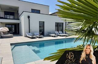 Einfamilienhaus kaufen in 7011 Siegendorf, Luxuriöses Einfamilienhaus mit Pool, Poolhaus & Smart Home nur 5 Min. von Eisenstadt entfernt