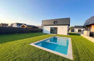 Einfamilienhaus kaufen in 4303 Sankt Pantaleon, Kompaktes Traumhaus mit Pool, großzügigem Garten und zwei Stellplätzen