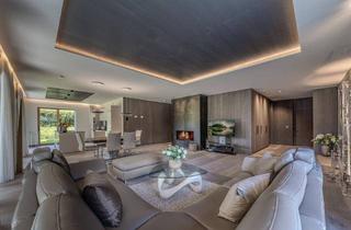 Wohnung kaufen in 6365 Kirchberg in Tirol, Luxuriöse Gartenresidenz mit großzügiger Terrasse und stilvollem Wohnambiente