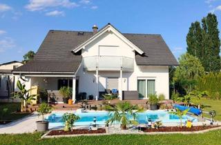 Haus kaufen in Laudongasse 1a, 7423 Pinkafeld, Provisionsfrei- ohne Makler Energiesparhaus mit beheizbarem GFK-Pool & XL-Garage: Zentrales Wohnglück in Pinkafeld