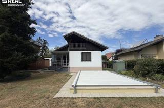 Einfamilienhaus kaufen in 2402 Maria Ellend, Wohnen am Waldrand - Gepflegtes Einfamilienhaus mit Pool, Garage und Keller