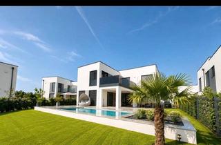 Villen zu kaufen in Trappenfeldsee, 2522 Oberwaltersdorf, Exklusive Seevilla mit Pool & privatem Seezugang - Luxuswohnen im Wohnpark Giardino, Oberwaltersdorf