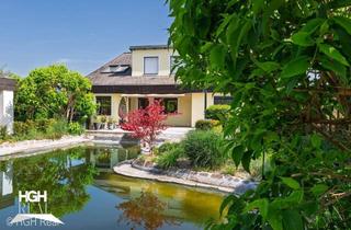 Villen zu kaufen in 2100 Korneuburg, 2100 Korneuburg Exklusive Villa - zwei getrennte Wohneinheiten - mit großem Schwimmteich unweit Bahnhof