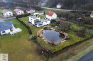 Haus kaufen in 7473 Hannersdorf, Jeden Tag ein Stück Urlaub – modernes Passivhaus mit Natur-Schwimmteich auf 3.149 m² Eigengrund
