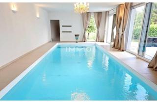Villen zu kaufen in 2511 Pfaffstätten, Zeitlose Architektur trifft Großzügigkeit - Designvilla mit Indoor-Pool und Einliegeroption
