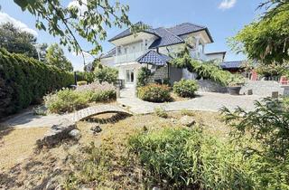 Einfamilienhaus kaufen in 4614 Marchtrenk, Traumhaus mit Salzwasserpool, Wellnesskeller & märchenhaftem Gartenparadies | 245 m² Nutzfläche