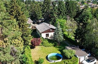 Einfamilienhaus kaufen in 8042 Graz, Zuhause im Grünen: Charmantes Einfamilienhaus auf Großzügigem 1.065M²-Grund in Graz St. Peter
