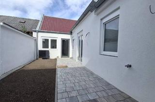 Haus kaufen in 2460 Bruck an der Leitha, STADTBUNGALOW! Barrierefrei mit 4 Zimmern & Garten