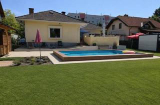 Haus kaufen in 1210 Wien, Wohnen mit Urlaubsflair | riesiges Grundstück (Teilung möglich) mit großer Terrasse und Pool | Offener Kamin und Klimaanlage | U1-Station | Garage