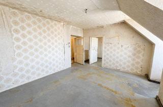 Wohnung kaufen in Schwaigergasse, 1210 Wien, Gemütliche Dachgeschosswohnung wartet auf Ihre persönliche Handschrift!