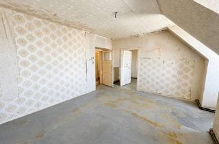 Wohnung kaufen in Schwaigergasse, 1210 Wien, Gemütliche Dachgeschosswohnung wartet auf Ihre persönliche Handschrift!