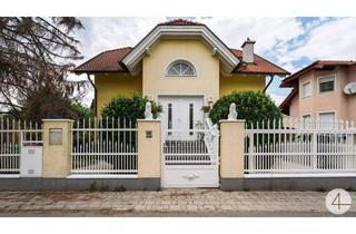 Einfamilienhaus kaufen in 1220 Wien, Wohnen mit Stil – Exklusives Einfamilienhaus mit traumhaftem Garten und idyllischem Teich !