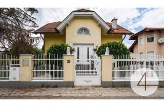 Einfamilienhaus kaufen in 1220 Wien, Wohnen mit Stil – Exklusives Einfamilienhaus mit traumhaftem Garten und idyllischem Teich !
