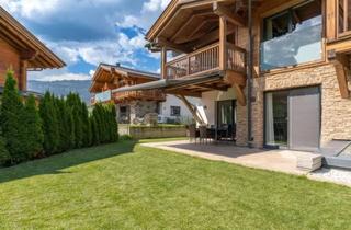 Wohnung kaufen in 5721 Piesendorf, Neuwertige Gartenwohnung mit Panoramablick – 6-Zimmer-Alpenlodge mit voll ausgebautes Souterrain