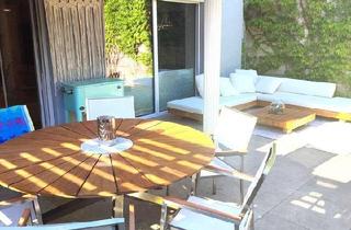Wohnung kaufen in 2500 Baden, Exquisites Wohnen mit großzügiger Sonnen-Terrasse und Schwimmbiotop