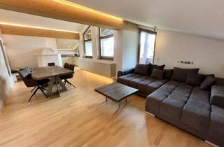 Wohnung kaufen in 6380 Sankt Johann in Tirol, Sonnige Dachgeschosswohnung mit Südbalkon, Kamin & 2 TG-Stellplätzen – St. Johann in Tirol