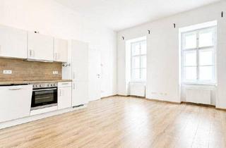 Wohnung kaufen in 1080 Wien, Stilvolle Altbauwohnung in der Josefstadt – 2 Zimmer mit genehmigtem Balkon