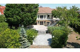 Villen zu kaufen in 7100 Neusiedl am See, Gepflegte Villa mit direktem Seeblick, Schwimmbiotop und Doppelgarage in Neusiedl am See
