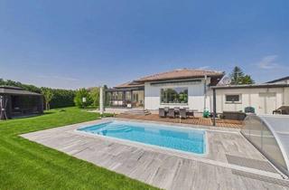 Haus kaufen in 2292 Stopfenreuth, Moderner Bungalow mit Pool, Garage und Traumgarten – Wohnen auf einer Ebene