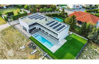 Villen zu kaufen in 2604 Theresienfeld, Exklusive Designvilla mit repräsentativem Firmensitz, 15-Meter-Pool und privater Fahrzeuggarage