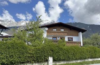 Mehrfamilienhaus kaufen in 6414 Untermieming, Ruhig Gelegenes Mehrfamilienhaus mit Drei Einheiten und Garten