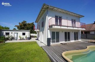 Einfamilienhaus kaufen in 2511 Pfaffstätten, Familienidylle in Pfaffstätten - Geräumiges Einfamilienhaus mit Wohnkeller, Büro, Doppelgarage und Garten mit Pool