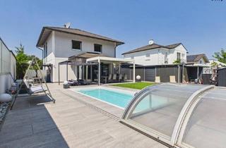 Einfamilienhaus kaufen in 2483 Ebreichsdorf, Exklusives Einfamilienhaus mit beheiztem Pool & großzügigem Garten in Ebreichsdorf