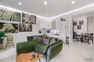 Wohnung kaufen in 1080 Wien, Ruheoase im Altbau: 2-Zimmer-Wohnung mit Terrasse und Garten