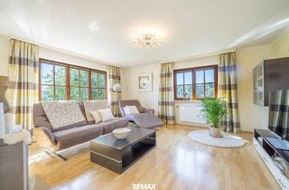 Wohnung kaufen in 5202 Neumarkt am Wallersee, Exklusives Wohnambiente mit Privatgarten in Neumarkt am Wallersee