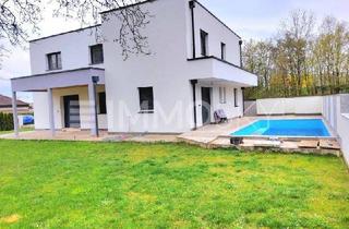 Haus kaufen in 4600 Wels, Modernes Doppel-Eigenheim für 2 Familien, Garten, Pool und 2 Garagen!