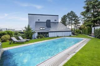 Haus kaufen in 2700 Wiener Neustadt, Blickfang mit Privatsphäre! Außergewöhnliches Designerhaus mit viel Raum zur Entfaltung | 9 Zimmer, Edelstahlpool, Sauna, Weinkeller | Vereint Wohnen und Arbeiten | Barrierefrei