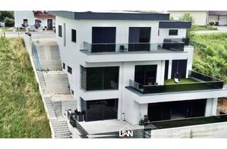 Villen zu kaufen in 5233 Pischelsdorf am Engelbach, Exklusive Villa auf drei Ebenen mit Indoor-Pool und Weitblick ins Grüne