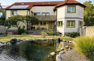 Haus kaufen in 7141 Podersdorf am See, Podersdorf- Zweifamilienhaus mit Lagerhalle und Garten- viel Platz für alle!