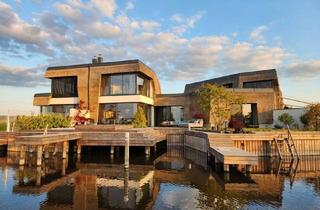 Villen zu kaufen in 7100 Neusiedl am See, Einzigartige Seevilla mit direktem Seezugang und Bootsliegeplatz in Neusiedl am See