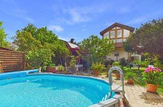 Haus kaufen in 2512 Tribuswinkel, Entzückendes Zweifamilienhaus mit Pool, traumhaftem Garten und Garage in toller Lage in Tribuswinkel zu kaufen!