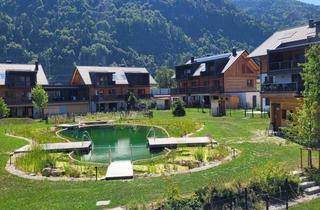 Wohnung kaufen in 9601 Arnoldstein, Alpiner Wohnstil in beeindruckender Bergkulisse – mit exklusivem Bio-Schwimmteich