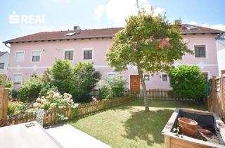 Reihenhaus kaufen in 1220 Wien, Familienhit in Essling: Massiv-Reihenhaus mit Eigengarten, Sauna & sensationell niedrigen Betriebskosten!