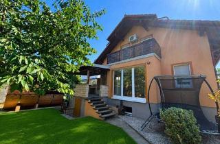 Einfamilienhaus kaufen in 2460 Bruckneudorf, Bruckneudorf - Exklusives Familienparadies mit Wellnessoase & Männerrefugium