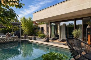 Einfamilienhaus kaufen in 2491 Hornstein, Einzigartiger Design-Bungalow mit Schwimmteich & Wellnessgarten nahe dem Neufelder See